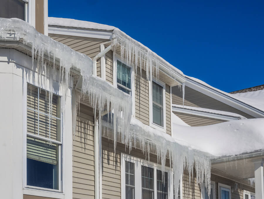 ice dams on the roof of a house