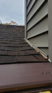 poorly sealed flashing on a roof in need of repair